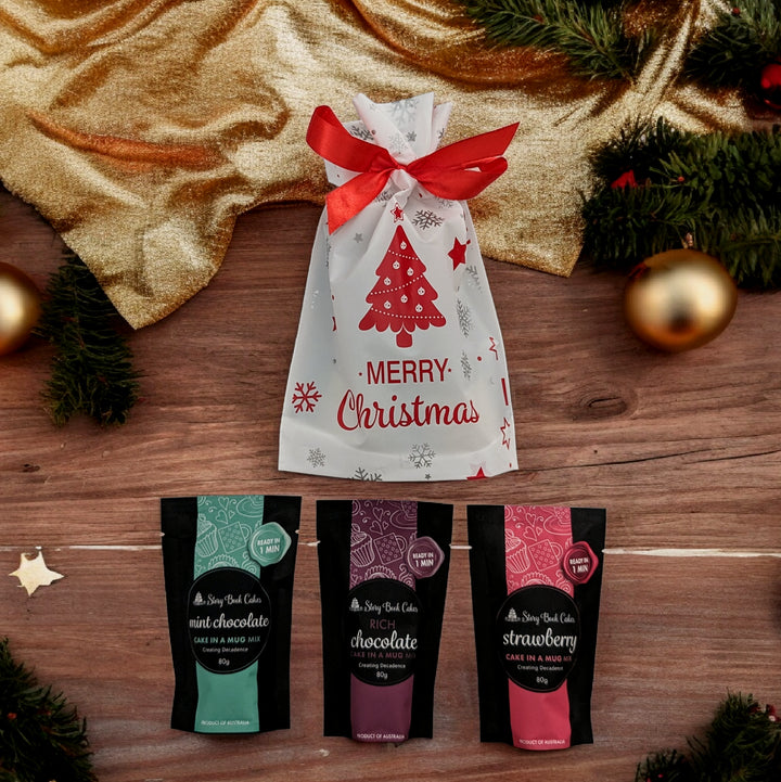 Christmas gift bag with Gold Bows and 3 x Mud Cake in a Mug